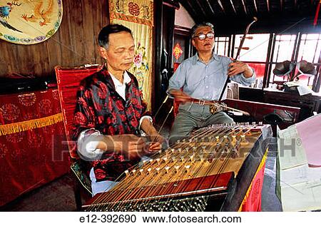 China. Shnaghai. Ton Li Little town, traditional Tea House, musicians View Large Photo Image Stock Image - China. Shnaghai. Ton Li Little town, traditional Tea House, musicians. Fotosearch