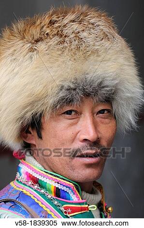 China, Sichuan, Kham, Danba, Khampa wearing a fur cap View Large Photo Image Stock Photography - China, Sichuan, Kham, Danba, Khampa wearing a fur cap. Fotosearch