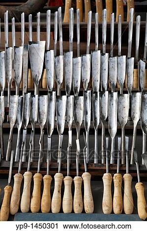 Stock Image - China - Xinjiang Province - Kashgar - tools for sale in the old town. Fotosearch