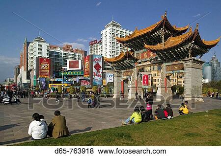 China. Yunnan Province. Kunming: Memorial Arch of the Golden Horse and Jade Rooster in Jinmabiji Square / Daytime View Large Photo Image Stock Photo - China. Yunnan Province. Kunming: Memorial Arch of the Golden Horse and Jade Rooster in Jinmabiji Square / Daytime. Fotosearch