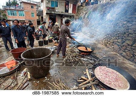 China, Yunnan province, Mengpin Yi people people, Yuanyang, Mengpin village, long street banquet festival, preparation of the food. View Large Photo Image Stock Photography - China, Yunnan province, Mengpin Yi people people, Yuanyang, Mengpin village, long street banquet festival, preparation of the food.. Fotosearch