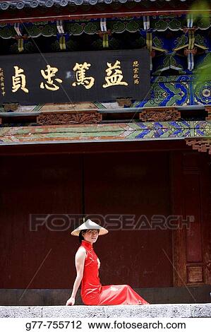 China, Yunnan Province, Shangri-La region, Lijiang, Chinese woman View Large Photo Image Stock Image - China, Yunnan Province, Shangri-La region, Lijiang, Chinese woman. Fotosearch