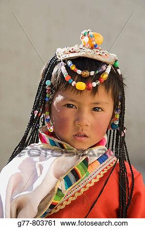 China Yunnan Shangri-La region Zhongdian, called Shangri La, on the Tibetan Border Girl of Naxi minority people MODEL RELEASE 1100 View Large Photo Image Stock Image - China Yunnan Shangri-La region Zhongdian, called Shangri La, on the Tibetan Border Girl of Naxi minority people MODEL RELEASE 1100. Fotosearch