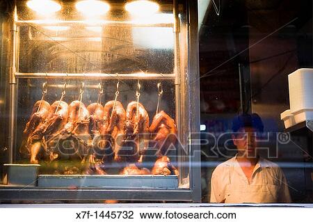 Chinatown Roasted chickens Restaurant in Bayard St, as seen from street, New York City, USA View Large Photo Image Stock Image - Chinatown Roasted chickens Restaurant in Bayard St, as seen from street, New York City, USA. Fotosearch