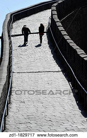 Chinese and foreign Visitors are walking are walking on the Great Wall of China View Large Photo Image Stock Photo - Chinese and foreign Visitors are walking are walking on the Great Wall of China. Fotosearch