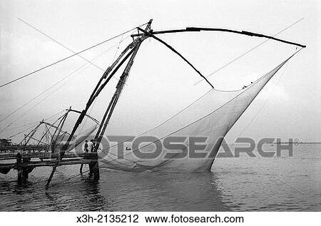 Stock Image - Chinese fishing nets at Kochi, State of Kerala, India, South Asia.. Fotosearch
