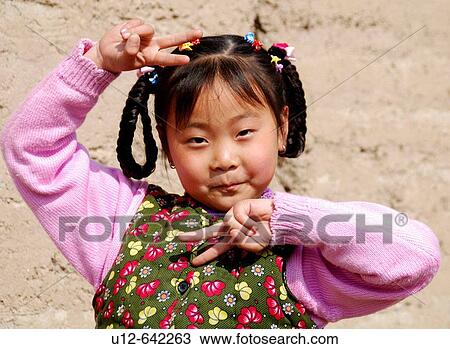 Chinese girl. Qinghai. Huzhu. China. View Large Photo Image Stock Image - Chinese girl. Qinghai. Huzhu. China.. Fotosearch
