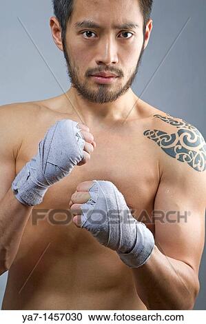 Chinese Kick Boxer with Tattoo View Large Photo Image Stock Image - Chinese Kick Boxer with Tattoo. Fotosearch