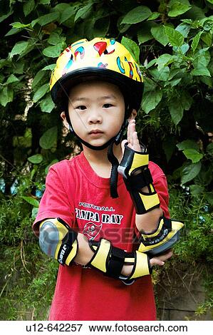 Stock Photo - Chinese little boy. Shenzhen. China.. Fotosearch
