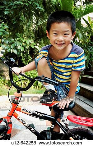 Chinese little boy. Shenzhen. China. View Large Photo Image Stock Photo - Chinese little boy. Shenzhen. China.. Fotosearch