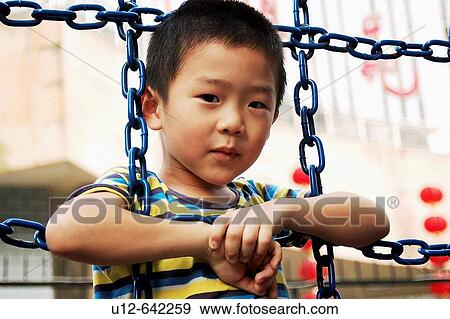 Chinese little boy. Shenzhen. China. View Large Photo Image Stock Photo - Chinese little boy. Shenzhen. China.. Fotosearch