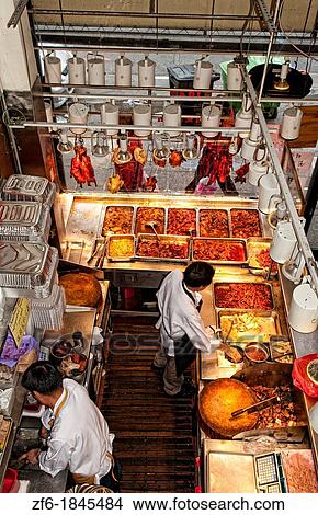 Chinese men from above arranging food in Chinatown San Francisco View Large Photo Image Picture - Chinese men from above arranging food in Chinatown San Francisco. Fotosearch