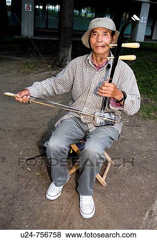 Chinese Musician, Harbourfront, Toronto View Large Photo Image Stock Photo - Chinese Musician, Harbourfront, Toronto. Fotosearch