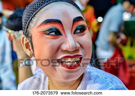 Chinese opera performer prepares for a performance at the Vegetarian Festival in Bangkok, Thailand. View Large Photo Image Stock Photo - Chinese opera performer prepares for a performance at the Vegetarian Festival in Bangkok, Thailand.. Fotosearch