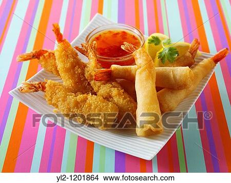 chinese starters - deep fried breaded prawns spring rolls, dim sum, and samosas View Large Photo Image Picture - chinese starters - deep fried breaded prawns spring rolls, dim sum, and samosas. Fotosearch