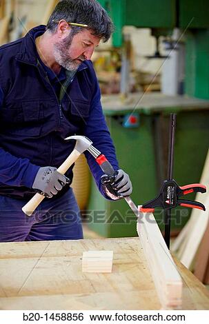 Chisel and hammer, woodworking and carpentry tools View Large Photo Image Stock Photograph - Chisel and hammer, woodworking and carpentry tools. Fotosearch