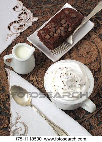 Chocolate brownie and cappuccino View Large Photo Image Stock Image - Chocolate brownie and cappuccino. Fotosearch