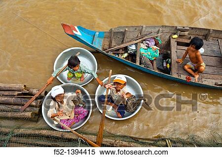 Stock Photography - Chong Khneas floating village Tonle Sap Lake Siem Reap province, Cambodia, Asia.. Fotosearch