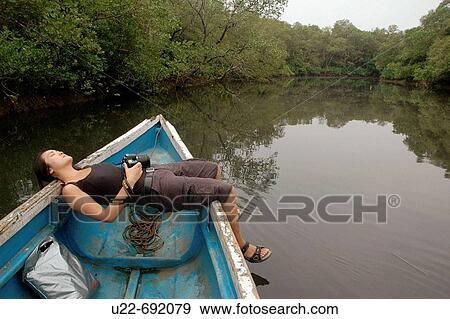 Chorao Island Goa, India: tourist on a boat View Large Photo Image Stock Photo - Chorao Island Goa, India: tourist on a boat. Fotosearch