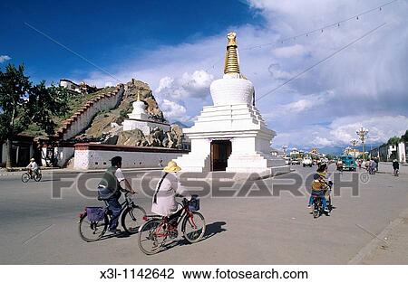 Chorten in the middle of the street at Potala Square Lhasa Tibet China View Large Photo Image Stock Image - Chorten in the middle of the street at Potala Square Lhasa Tibet China. Fotosearch