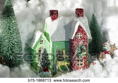 Christmas atmosphere of house with deer and snow View Large Photo Image Stock Image - Christmas atmosphere of house with deer and snow. Fotosearch