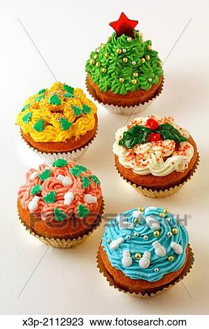 Stock Image - Christmas cupcakes.. Fotosearch