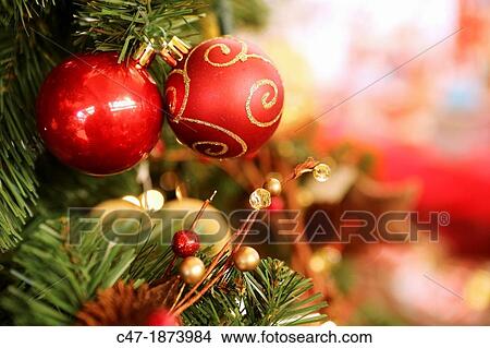Christmas decoration Red baubles on tree View Large Photo Image Picture - Christmas decoration Red baubles on tree. Fotosearch
