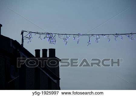 Stock Photo - christmas lights with buildings in wales, great britain, uk. Fotosearch