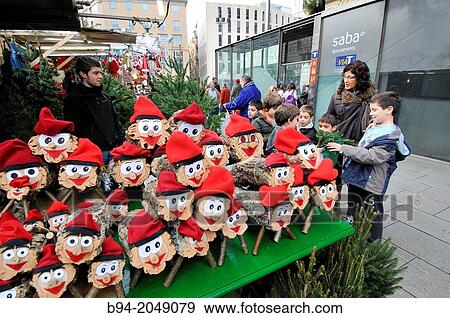 Christmas logs mythological character relating to a Christmas tradition in Catalonia for sale at fair. Fira de Santa Llcia, Barcelona, Catalonia, Spain. View Large Photo Image Stock Photo - Christmas logs mythological character relating to a Christmas tradition in Catalonia for sale at fair. Fira de Santa Llcia, Barcelona, Catalonia, Spain.. Fotosearch