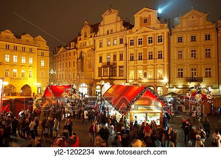 Picture - Christmas Market In Prague's Old Town Square at night time. Fotosearch