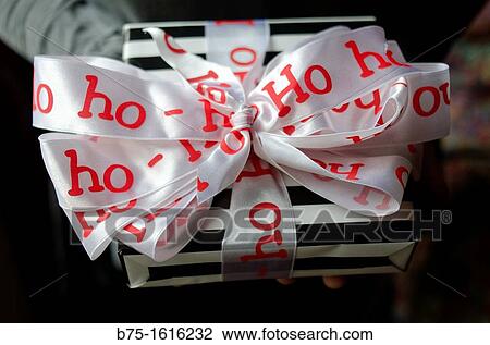 Stock Image - Christmas present with ribbon. Fotosearch