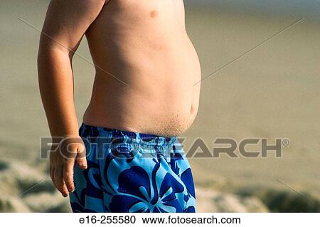Stock Image - chubby beach boy. Fotosearch