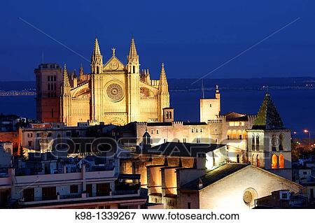 Church of La Santa Creu (in foreground) and Cathedral (in background), Majorca, Balearic Islands, Spain View Large Photo Image Stock Photo - Church of La Santa Creu (in foreground) and Cathedral (in background), Majorca, Balearic Islands, Spain. Fotosearch