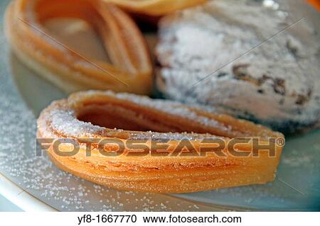 Churros and Buns for breakfast View Large Photo Image Stock Image - Churros and Buns for breakfast. Fotosearch