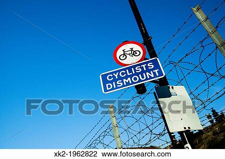Ciclists dismount sign, London, UK View Large Photo Image Stock Image - Ciclists dismount sign, London, UK. Fotosearch