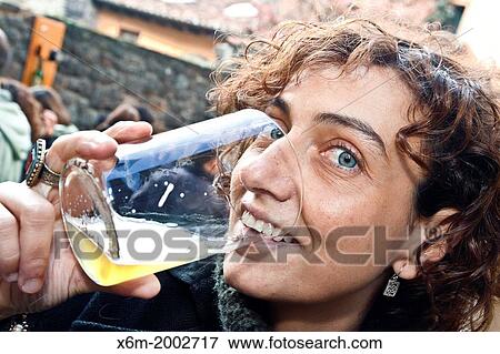 Stock Photo - Cider in street life. Potes, Comarca de Li? bana, Cantabria, Spain.. Fotosearch
