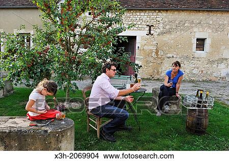 cider tasting together with Gregoire Ferre, cider producer, La Maison Ferre, cider farm, Comblot, Regional Natural Park of Perche, Orne department, Lower Normandy region, France, Western Europe. View Large Photo Image Picture - cider tasting together with Gregoire Ferre, cider producer, La Maison Ferre, cider farm, Comblot, Regional Natural Park of Perche, Orne department, Lower Normandy region, France, Western Europe.. Fotosearch