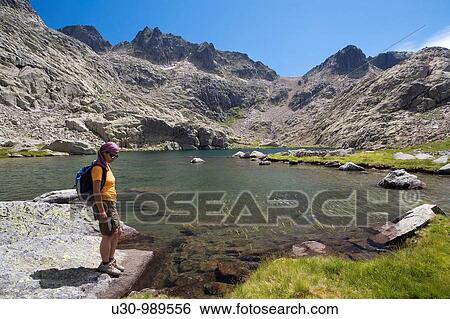 Cinco Lagunas Valley Garganta del Pinar Woman practice mountaineering in the mountains of the Sierra de Gredos National Park Zapardiel de la Ribera? vila Castilla y Le? n Spain View Large Photo Image Stock Photograph - Cinco Lagunas Valley Garganta del Pinar Woman practice mountaineering in the mountains of the Sierra de Gredos National Park Zapardiel de la Ribera? vila Castilla y Le? n Spain. Fotosearch