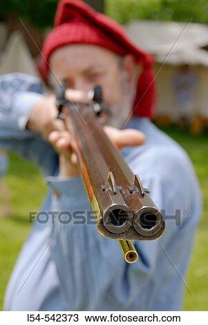 Circa 1700 reenactment of the Colonial period lifestyle in Southeastern Michigan at the Feaste of Sainte Claire Port Huron Michigan View Large Photo Image Stock Image - Circa 1700 reenactment of the Colonial period lifestyle in Southeastern Michigan at the Feaste of Sainte Claire Port Huron Michigan. Fotosearch
