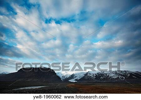 Cirrus clouds over glacier, Vatnajokull Ice Cap, Iceland. View Large Photo Image Stock Image - Cirrus clouds over glacier, Vatnajokull Ice Cap, Iceland.. Fotosearch