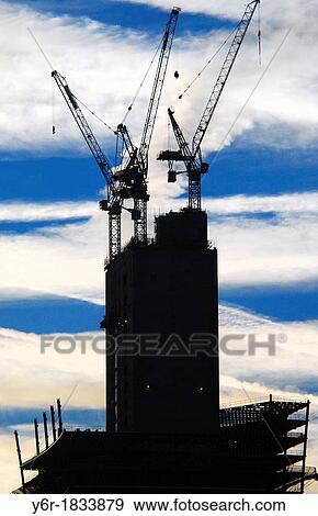 City of London construction project with giant cranes seen against the late evening sky in Summer View Large Photo Image Stock Photo - City of London construction project with giant cranes seen against the late evening sky in Summer. Fotosearch