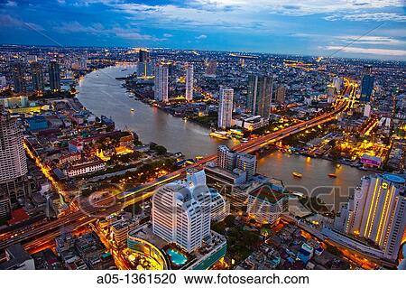 Stock Image - City Skyline and Chao Phraya River Bangkok Thailand.. Fotosearch