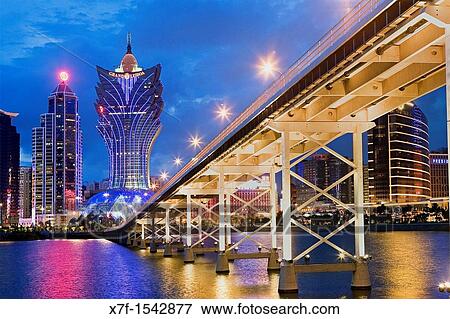 City Skyline with Bank of China Building, Grand Lisboa Hotel-Casino and Governador Nobre de Carvalho bridge, Macau, China View Large Photo Image Stock Photo - City Skyline with Bank of China Building, Grand Lisboa Hotel-Casino and Governador Nobre de Carvalho bridge, Macau, China. Fotosearch