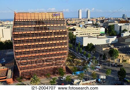 Cityscape. CMT building at 22@ district, designed by Enric Batlle and Joan Roig. At the horizon: Hotel Arts and Mapfre Tower. Poblenou, Barcelona, Catalonia, Spain. View Large Photo Image Stock Photo - Cityscape. CMT building at 22@ district, designed by Enric Batlle and Joan Roig. At the horizon: Hotel Arts and Mapfre Tower. Poblenou, Barcelona, Catalonia, Spain.. Fotosearch