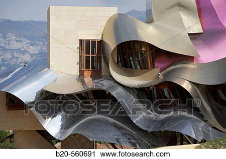 Ciudad del Vino, Herederos de Marques de Riscal winery building by Frank O. Gehry. Elciego, Rioja alavesa. Alava, Euskadi, Spain View Large Photo Image Stock Image - Ciudad del Vino, Herederos de Marques de Riscal winery building by Frank O. Gehry. Elciego, Rioja alavesa. Alava, Euskadi, Spain. Fotosearch