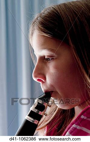 clarinet girl player View Large Photo Image Stock Photograph - clarinet girl player. Fotosearch