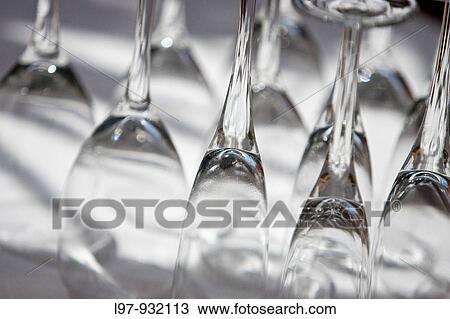 Stock Image - Classes on white table cloth. Fotosearch