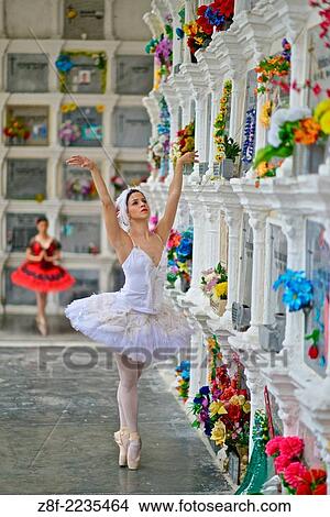 Picture - Classic ballerina at the San Pedro Cemetey in Medellin, declared monument in 1999.. Fotosearch