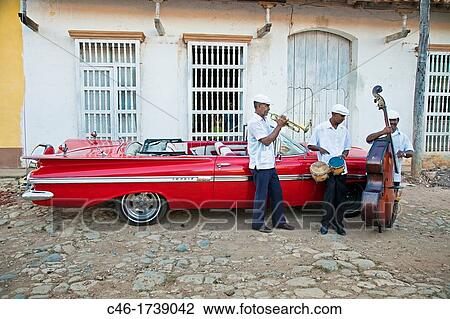 Classic car and music band, Trinidad city, Sancti Spiritus Province, Cuba. View Large Photo Image Stock Image - Classic car and music band, Trinidad city, Sancti Spiritus Province, Cuba.. Fotosearch
