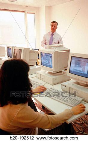 Stock Image - Classroom of computers, training at hospital. Fotosearch